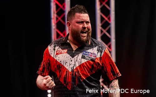 Michael Smith won de samen met Luke Humphries de World Cup of Darts 2024