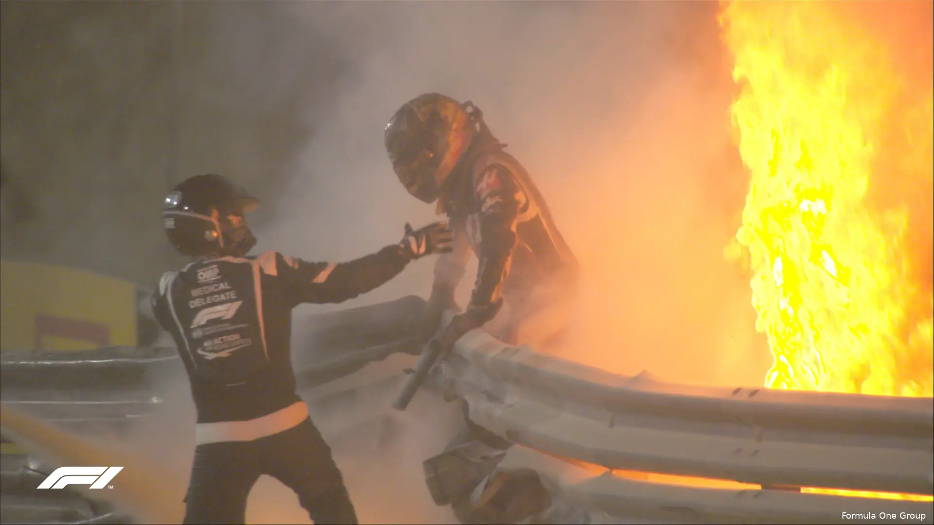 grosjean rescues himself from fire