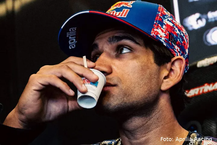 Jorge Martin drinks coffee in the Aprilia MotoGP garage