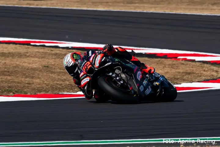 Marco Bezzecchi rides the Aprilia MotoGP bike at Silverstone