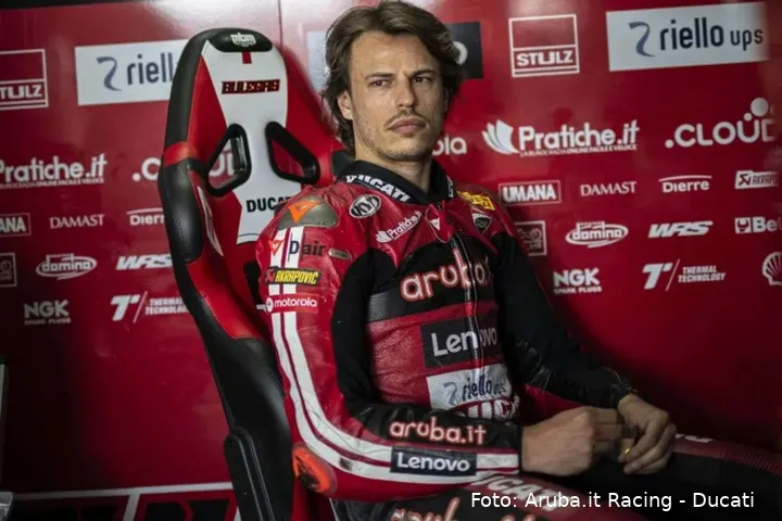 Nicolò Bulega Ducati Superbike rider sitting inside the Aruba Racing team box