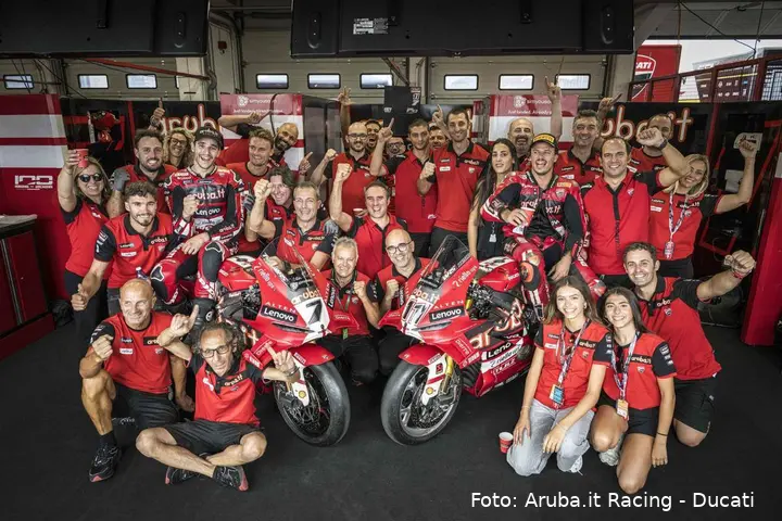 Bulega and Lecuona celebrating in the Aruba Ducati Superbike team garage