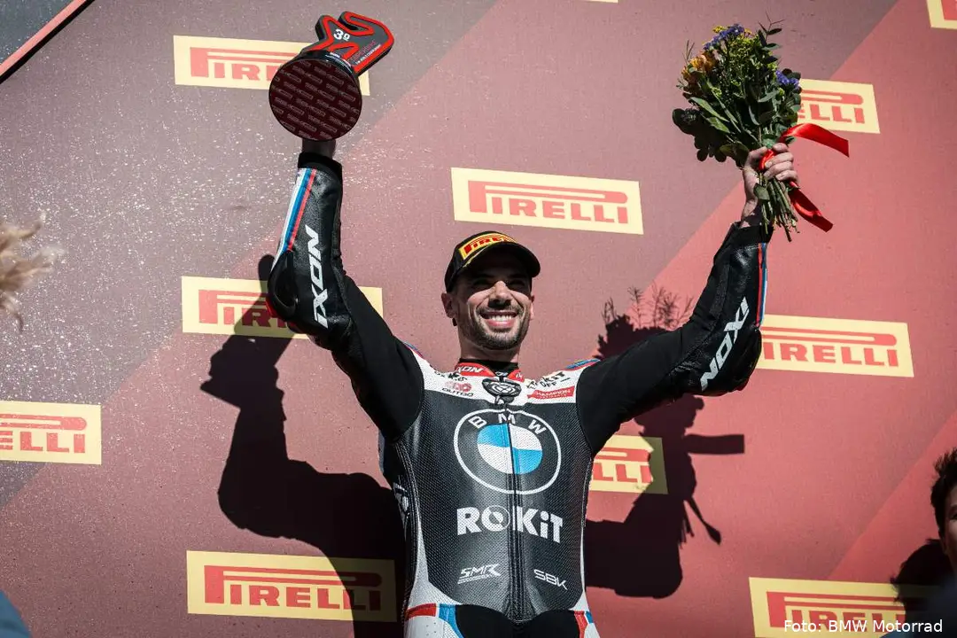 BMW rider Miguel Oliveira celebrates on the SBK podium