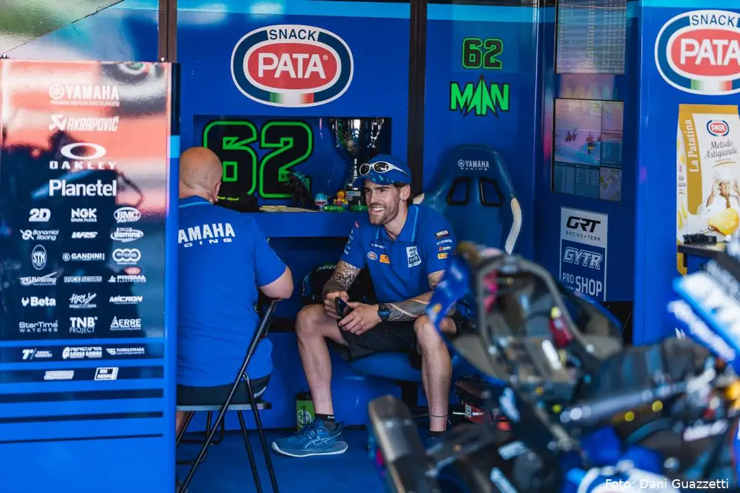 Stefano Manzi seated in the GRT Yamaha WorldSBK box