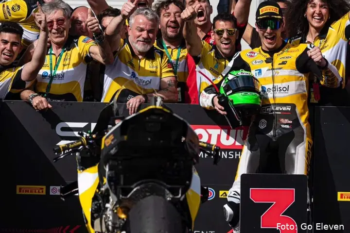 Team Go Eleven with Sacchetti and Baldassarri celebrates a Superbike podium