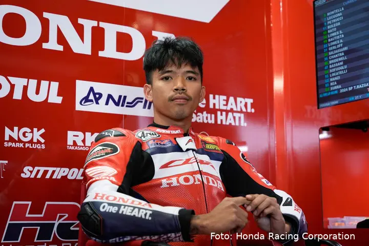 Somkiat Chantra seated in the Honda HRC WorldSBK box