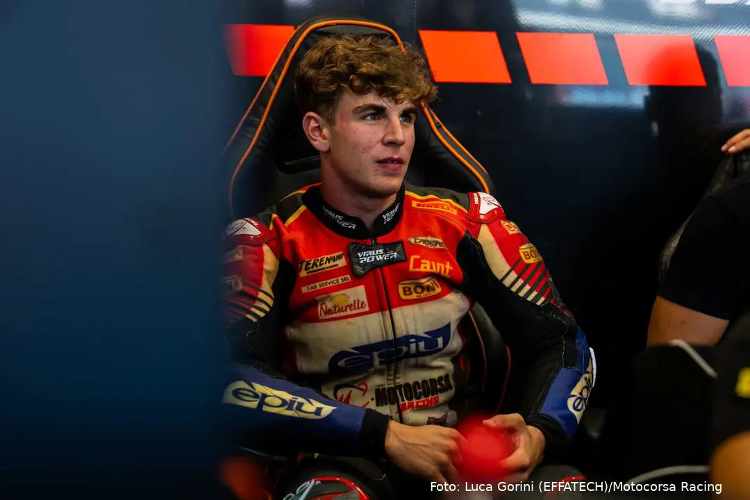 Alberto Surra sitting in the Motocorsa Racing Team Superbike garage