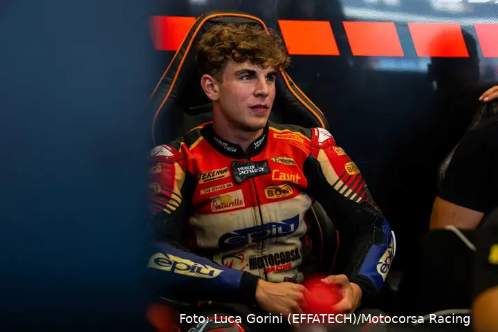 Alberto Surra sitting in the Motocorsa Racing Team Superbike garage