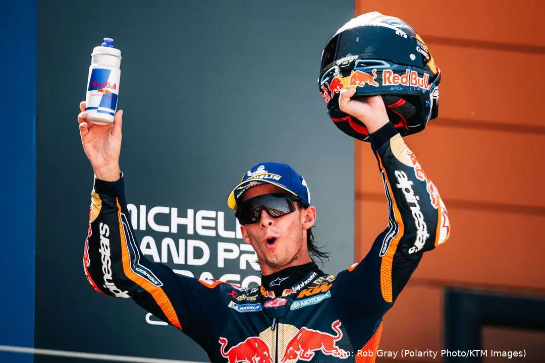 Pedro Acosta celebrates on the MotoGP podium at Aragon