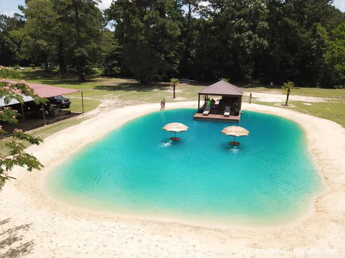 backyard beach swimming pond zydeco construction 1 5d3aa518b3220 700