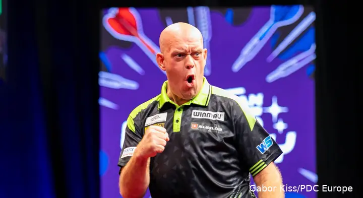 Michael van Gerwen puts fist up.