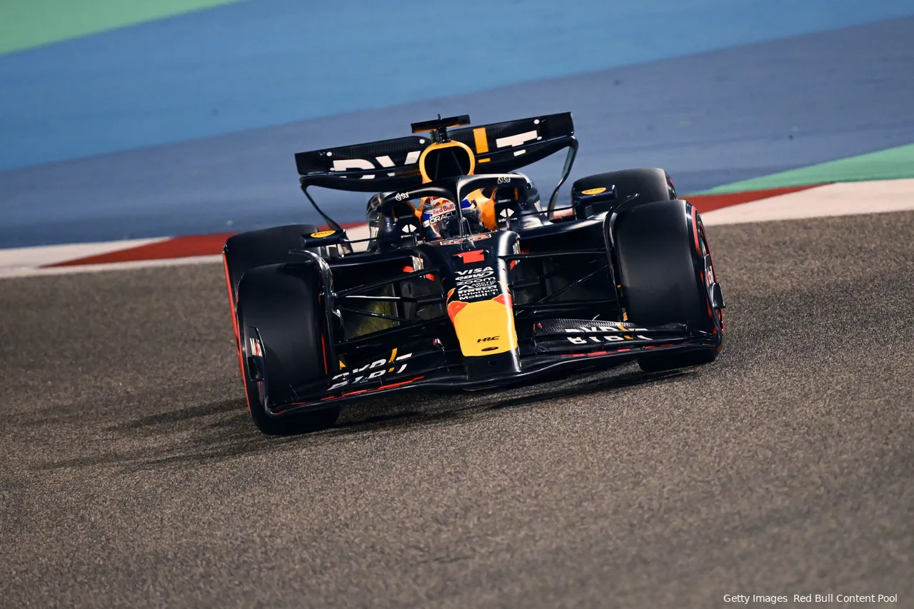 Max Verstappen is turning his RB20 into one of the corners at Bahrain International Circuit