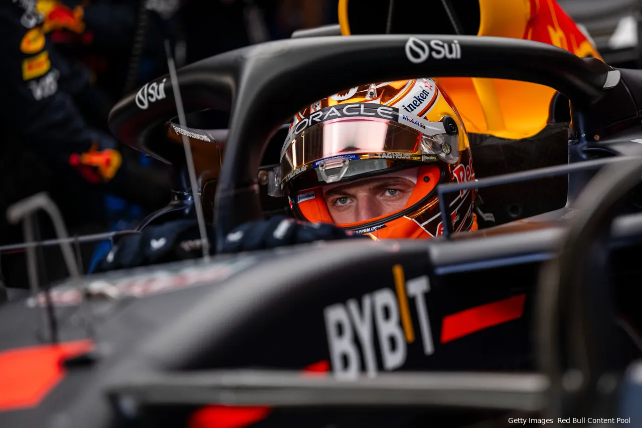 Close-up of Max Verstappen sitting in his car, fully focused, getting himself ready to go out on track