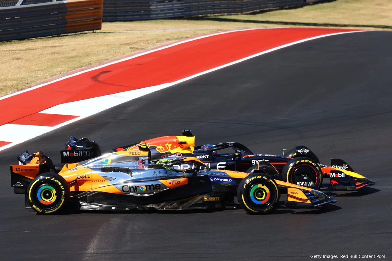 Max Verstappen and Lando Norris battle side by side in Turn 1 after the start of the 2024 United States Grand Prix, with Verstappen running Norris wide.