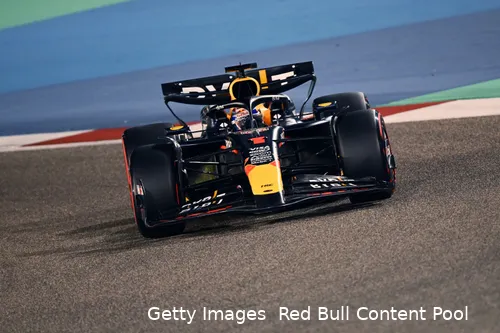 Max Verstappen is turning his RB20 into one of the corners at Bahrain International Circuit
