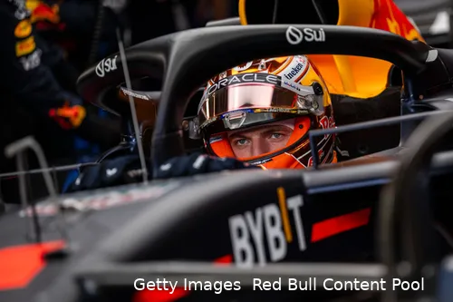 Close-up of Max Verstappen sitting in his car, fully focused, getting himself ready to go out on track
