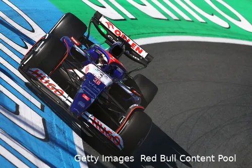 Close-up of Daniel Ricciardo maneuvering his car through the banked Turn 3 at Circuit Zandvoort during the 2024 Dutch Grand Prix race weekend.