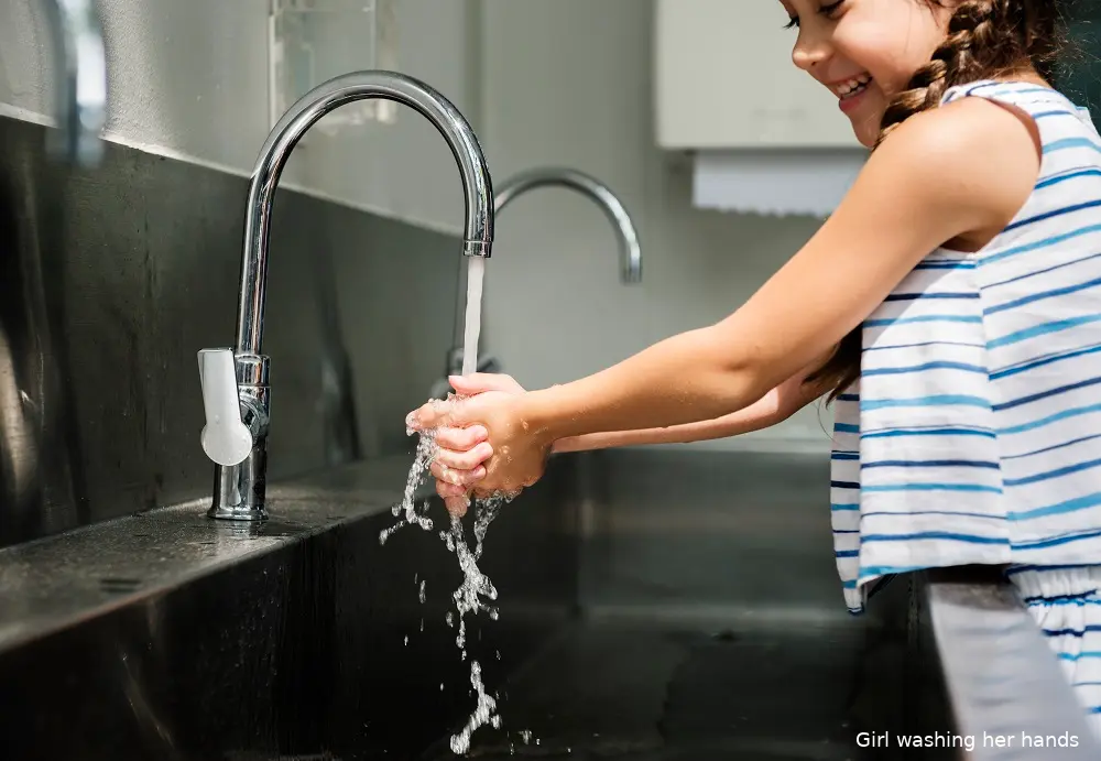 girl washing her hands