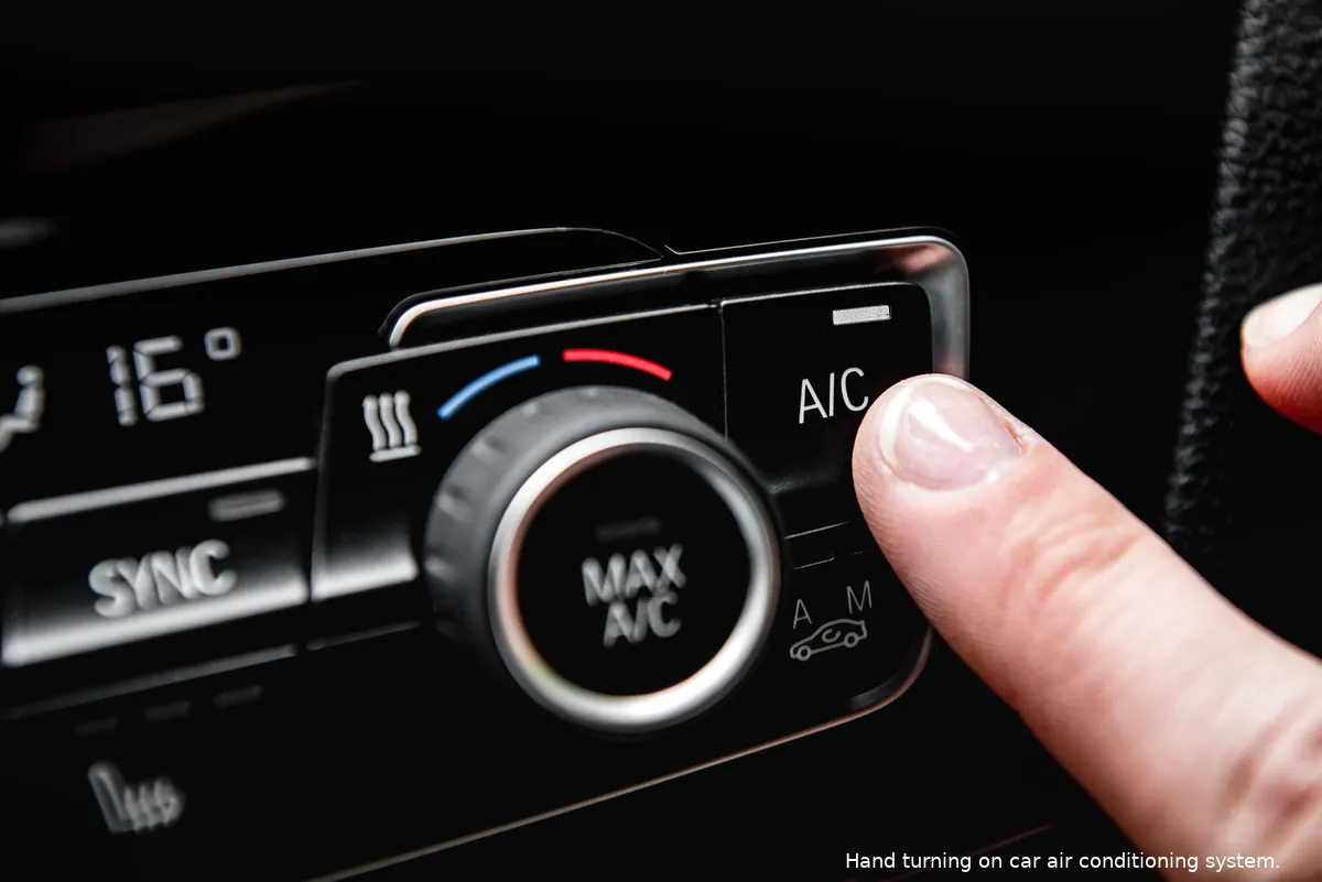 hand turning car air conditioning system