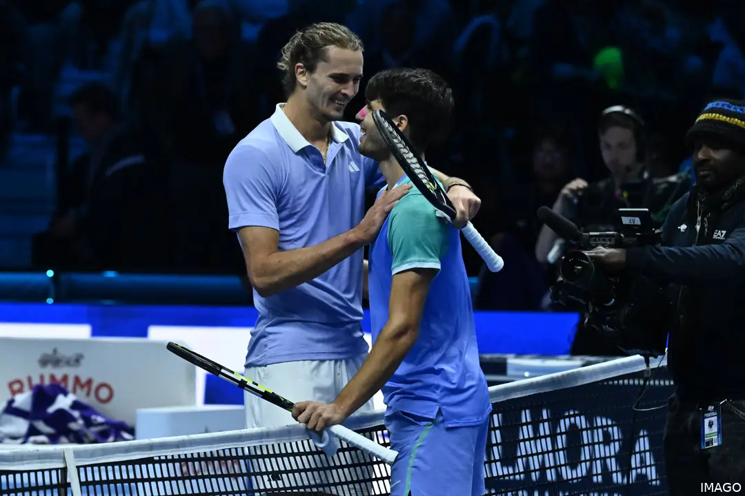 Carlos Alcaraz and Alexander Zverev embracing at the net