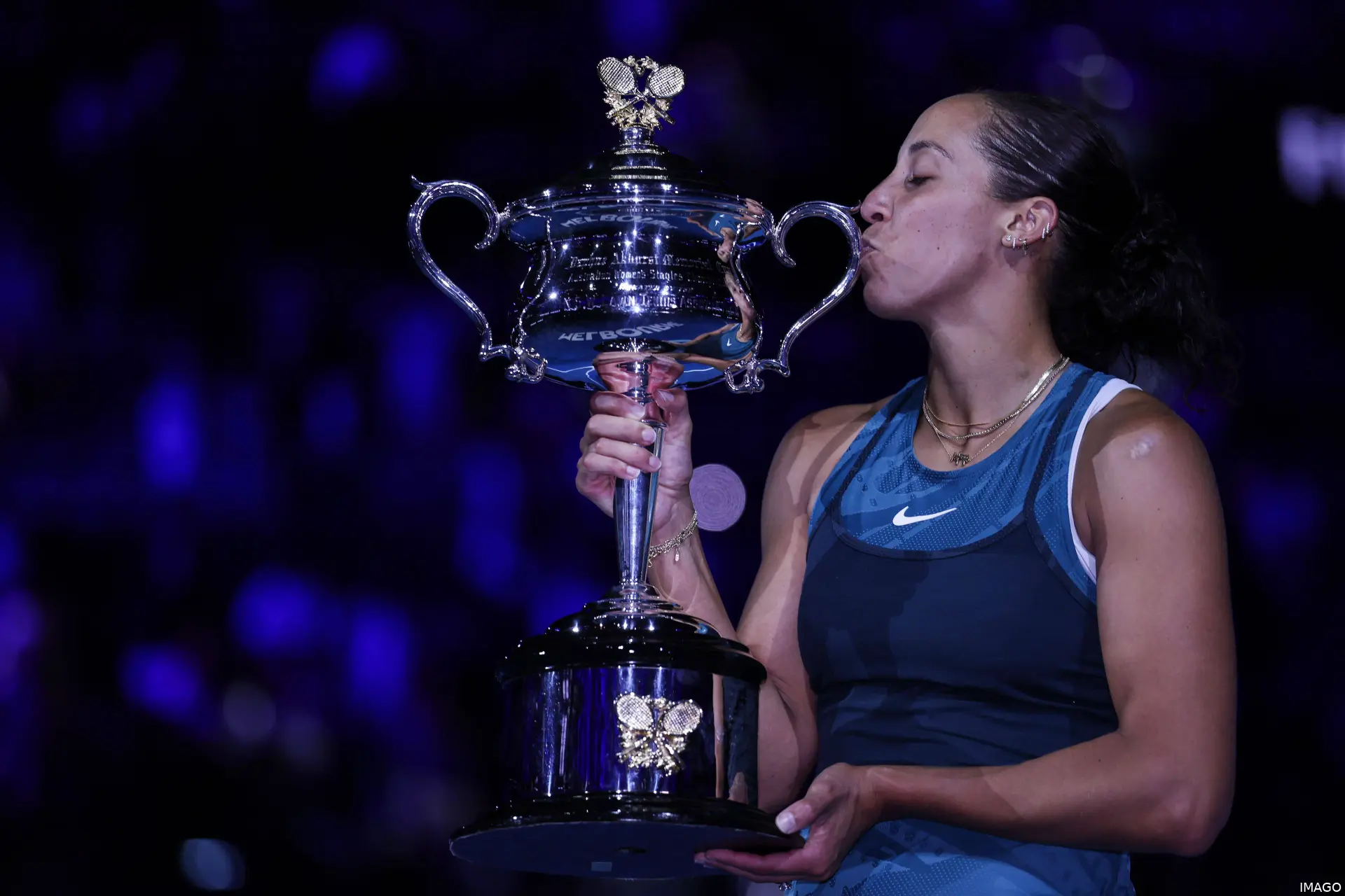 Madison Keys kissing the cup at the Australian Open 2025