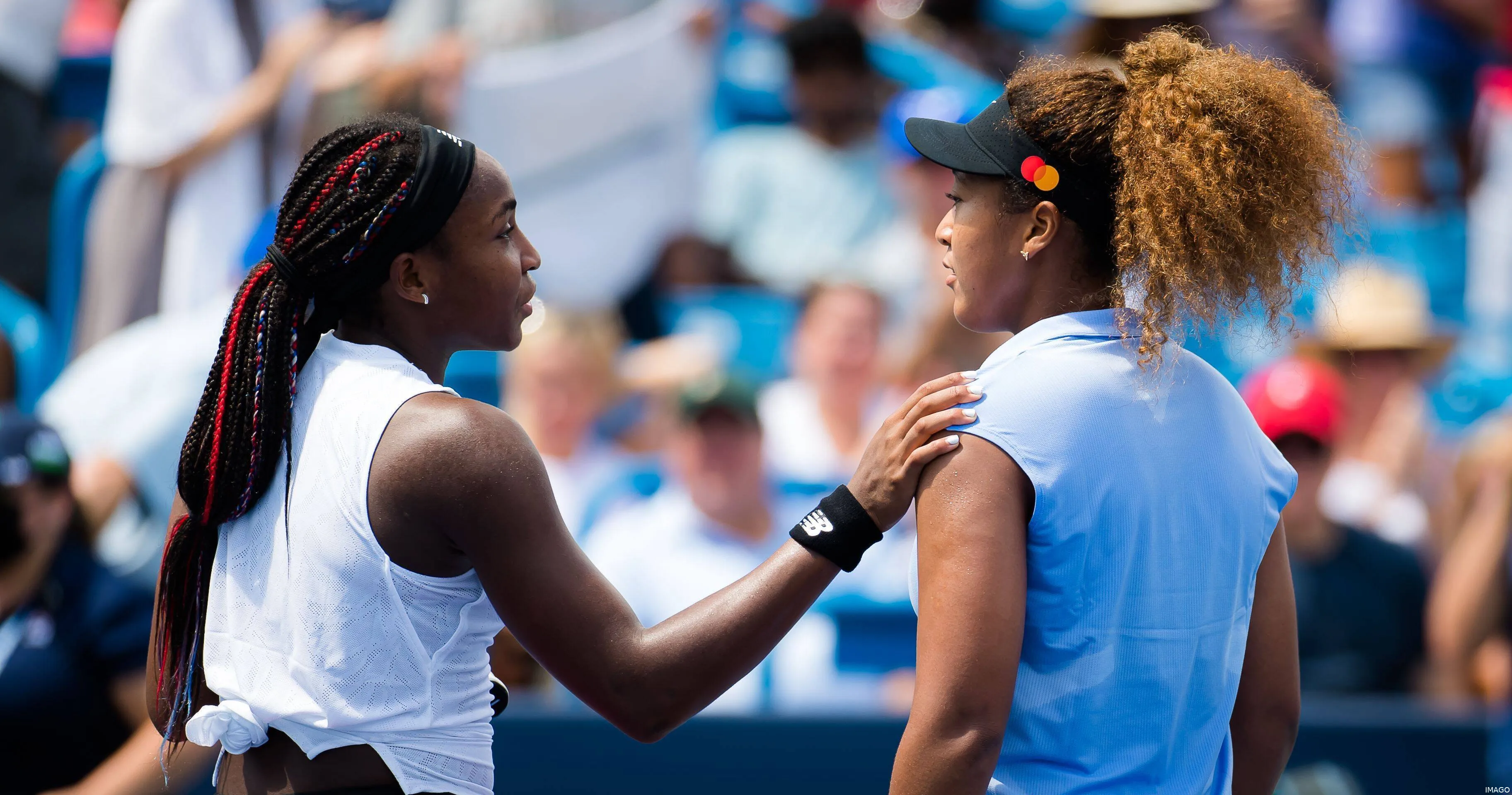 Coco Gauff and Naomi Osaka sharing some words after a match
