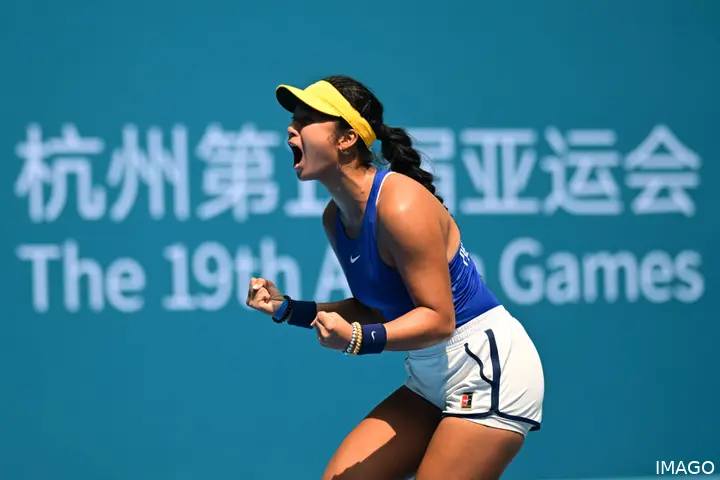Eala clenches both fists while celebrating a point at the 2022 Asian Games.