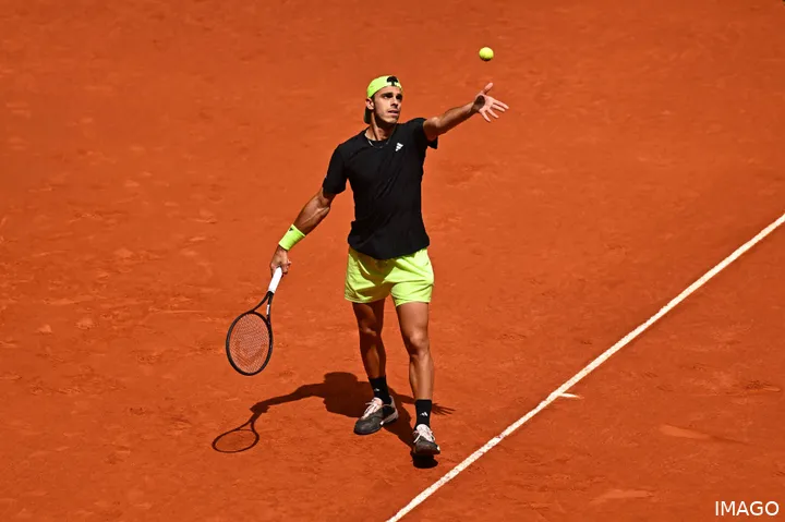 Cerundolo prepares to serve during his participation in Madrid Open