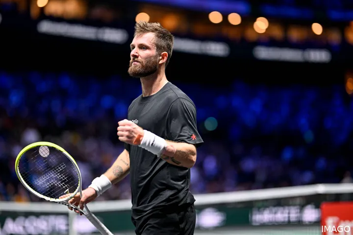 Corentin Moutet with a racket in his hand