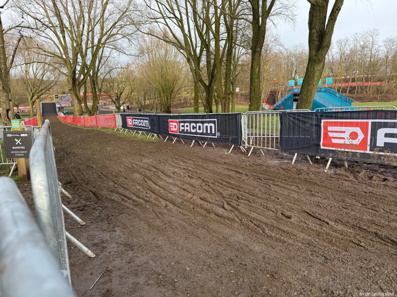 Then, the course gets muddier as riders descend onto the first bridge.