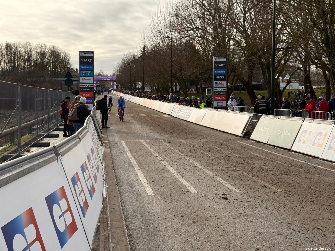 Right from the start, riders head uphill — not a steep climb, but the initial stretch on asphalt does have a slight incline.