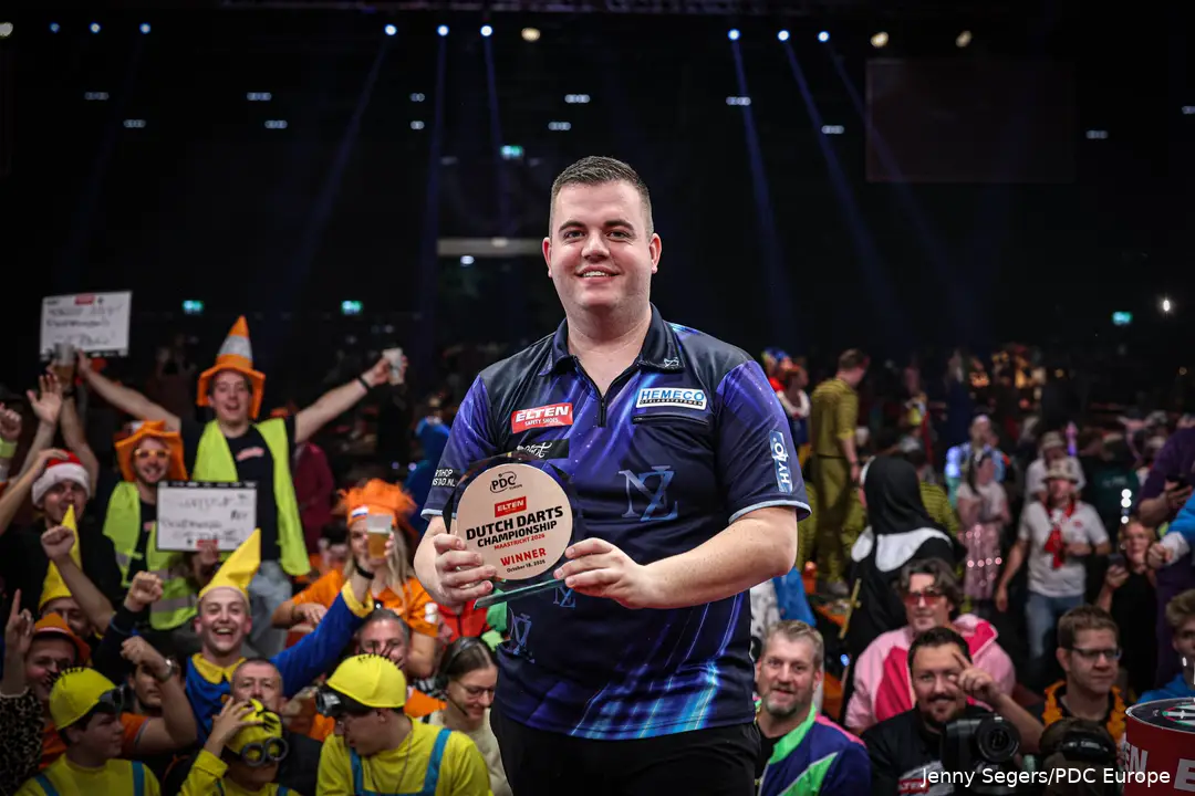 Niels Zonneveld holds the trophy aloft.