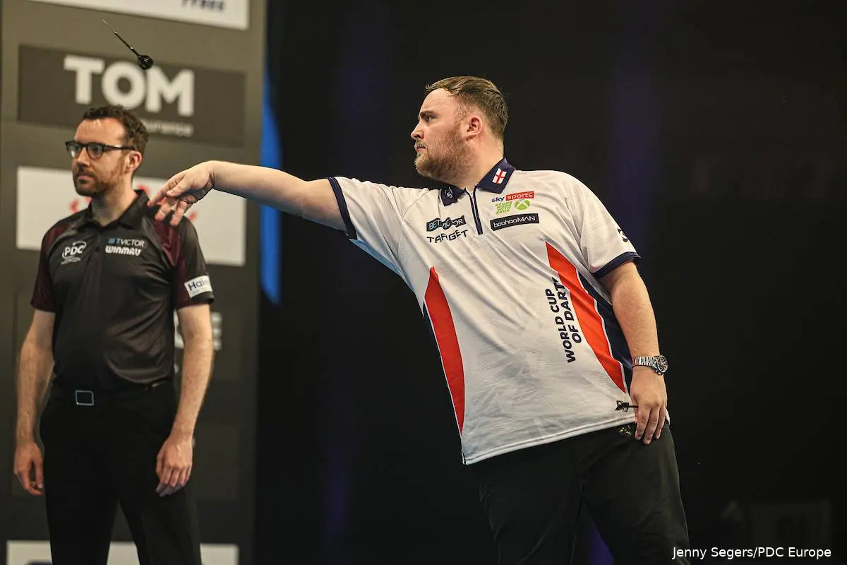 Luke Littler throws a dart