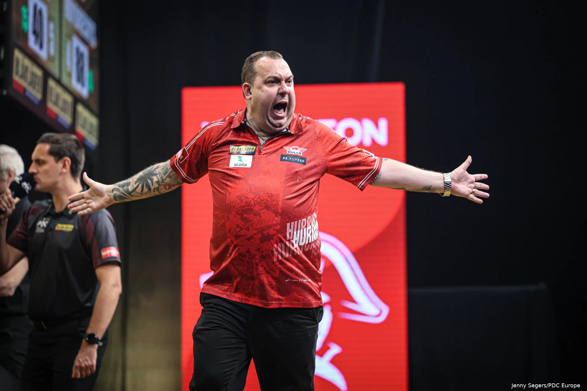 Kim Huybrechts celebrates winning a leg