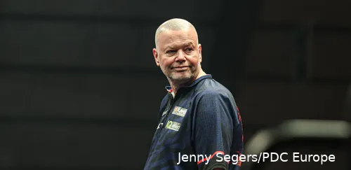 Raymond van Barneveld looks over his shoulder toward his own supporters in the crowd.