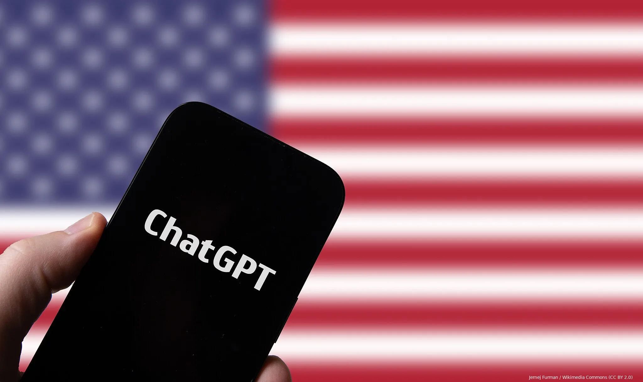 hand holding smartphone with openai chat gpt against flag of usa 52916339922