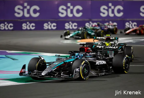 George Russell followed by Lewis Hamilton around Jeddah Corniche Circuit