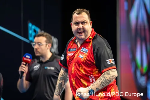 Kim Huybrechts in action at the World Cup of Darts
