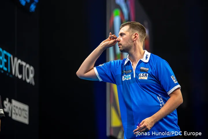 Harju in action at the last World Cup of Darts for Finland