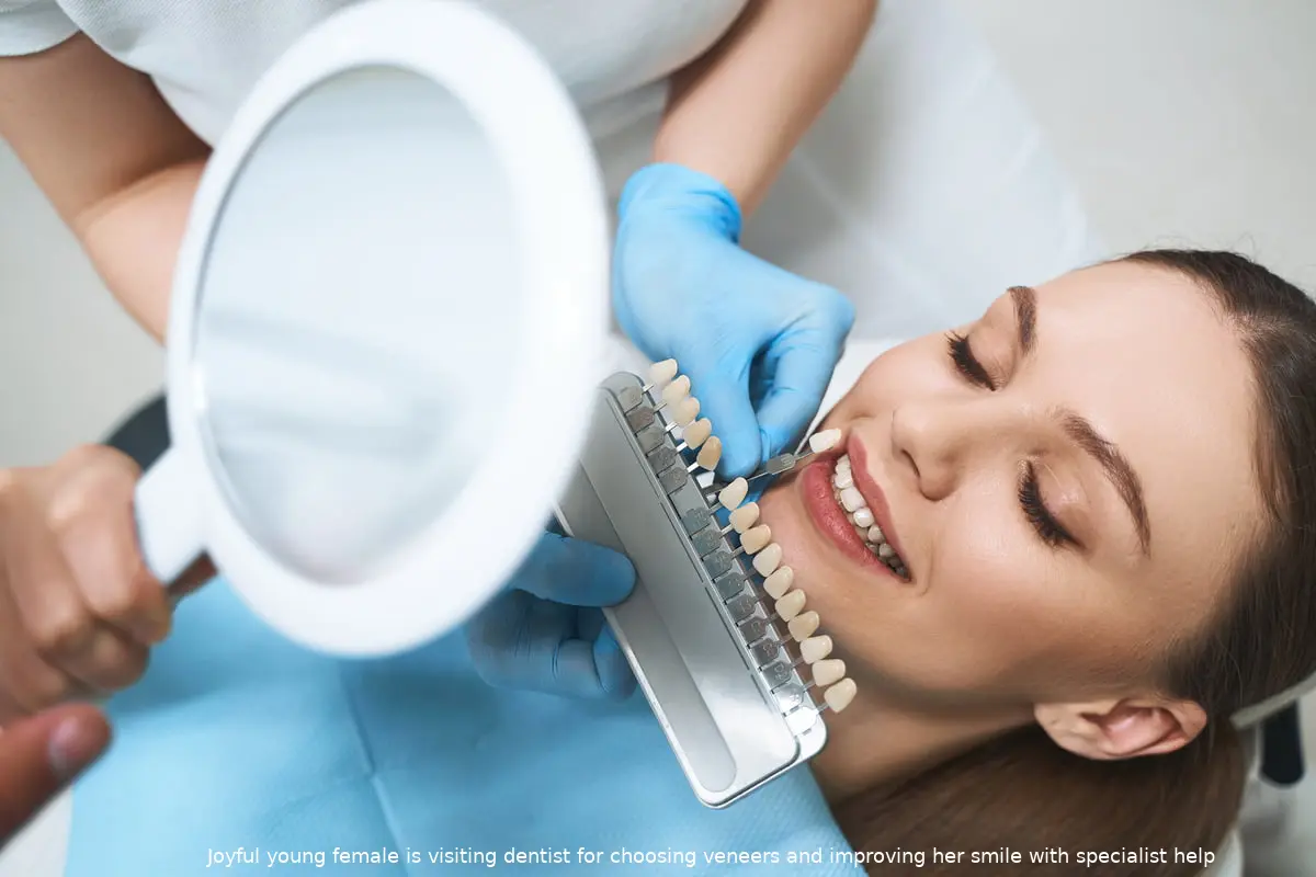 joyful young female is visiting dentist choosing veneers improving her smile with specialist help