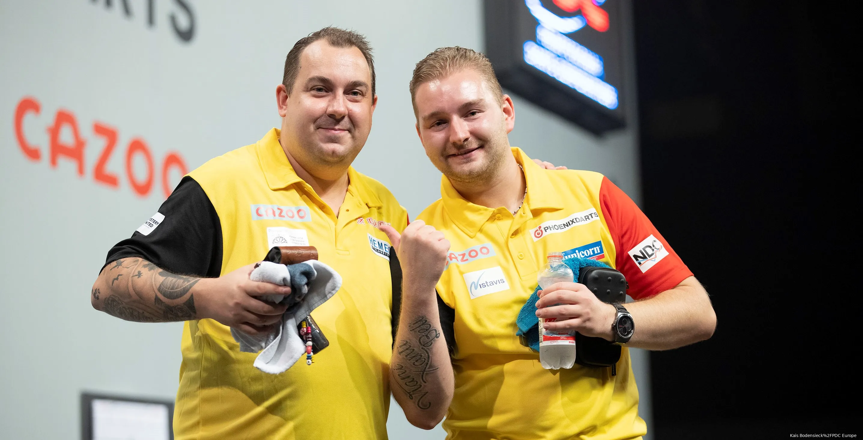 Kim Huybrechts und Dimitri Van den Bergh bei World Cup of Darts