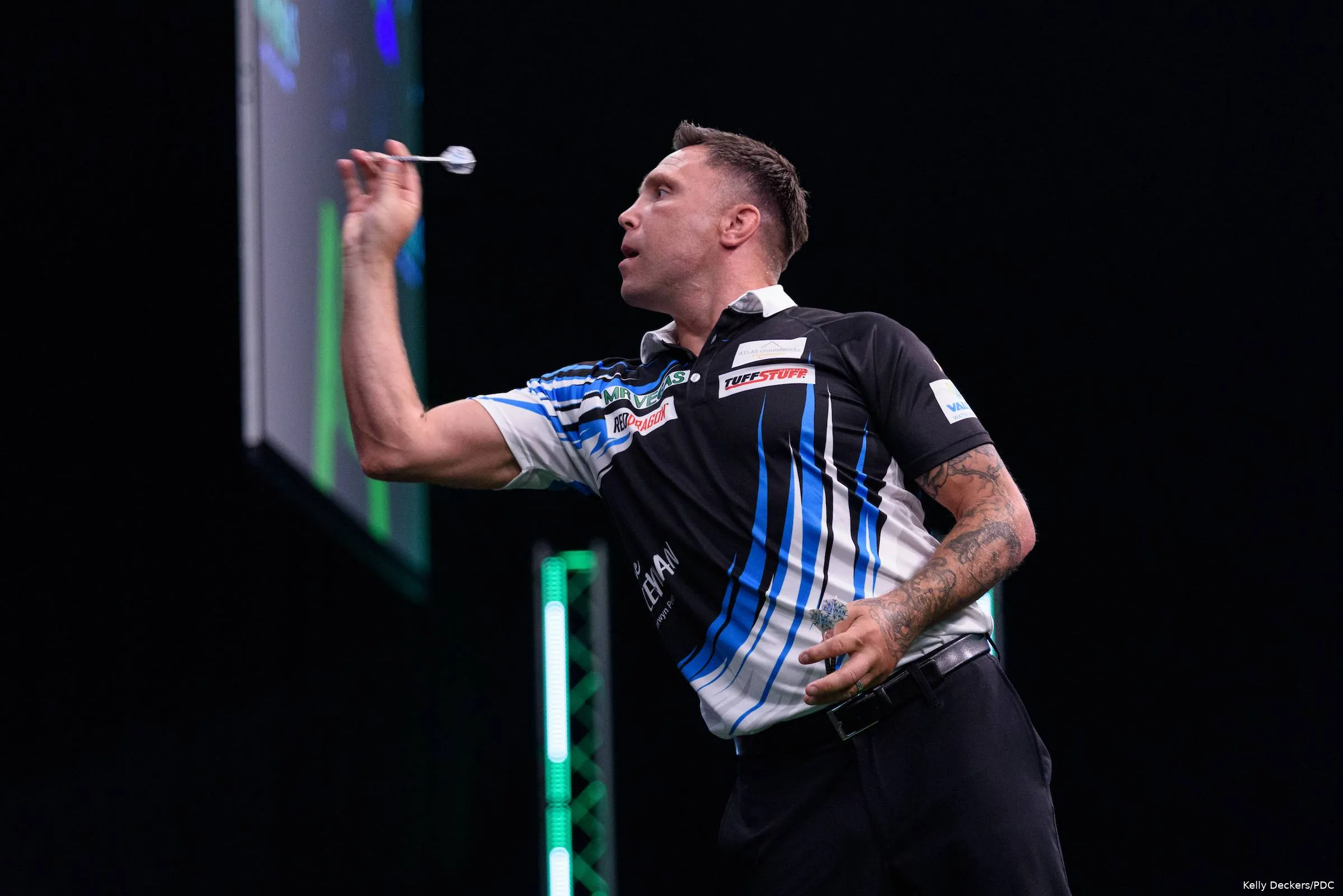 Gerwyn Price throws dart.
