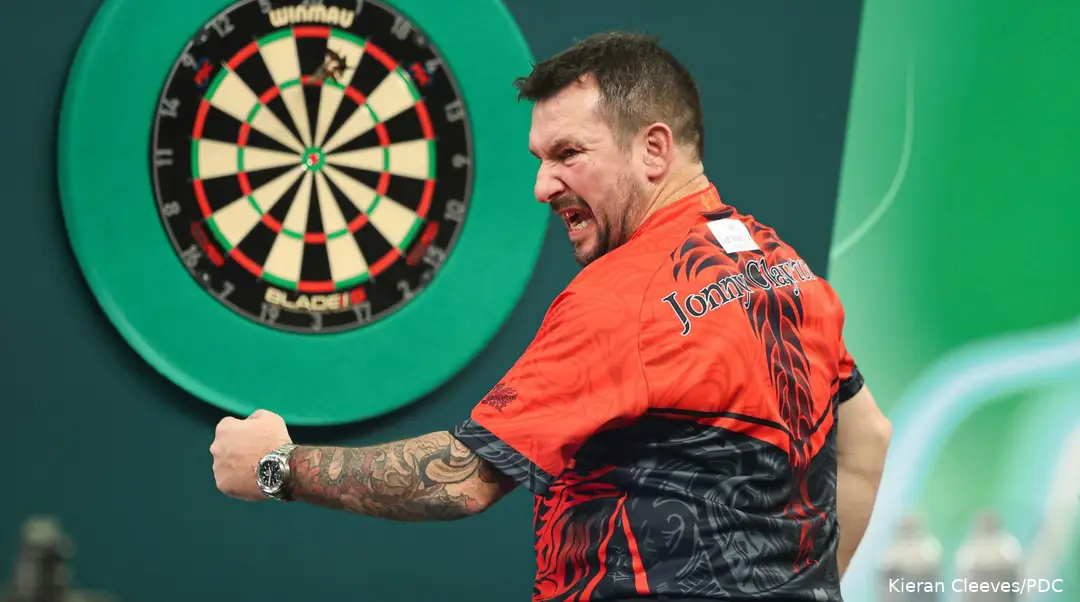 Jonny Clayton takes on Daryl Gurney in the third round of the PDC World Darts Championship.