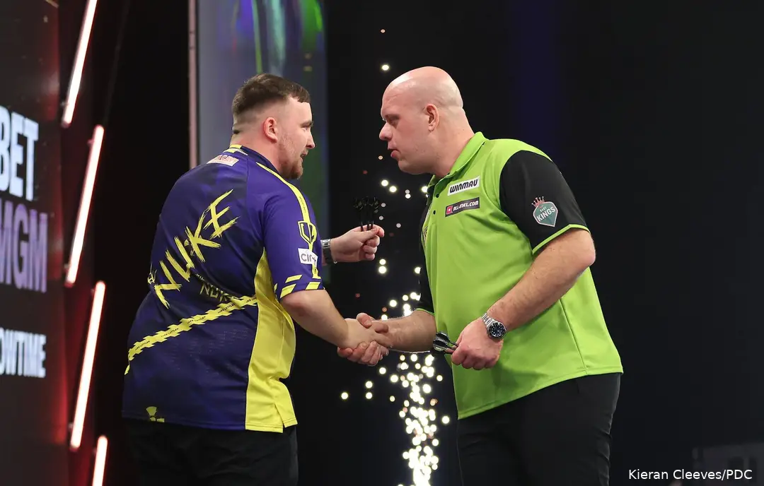 Luke Littler and Michael van Gerwen shake hands