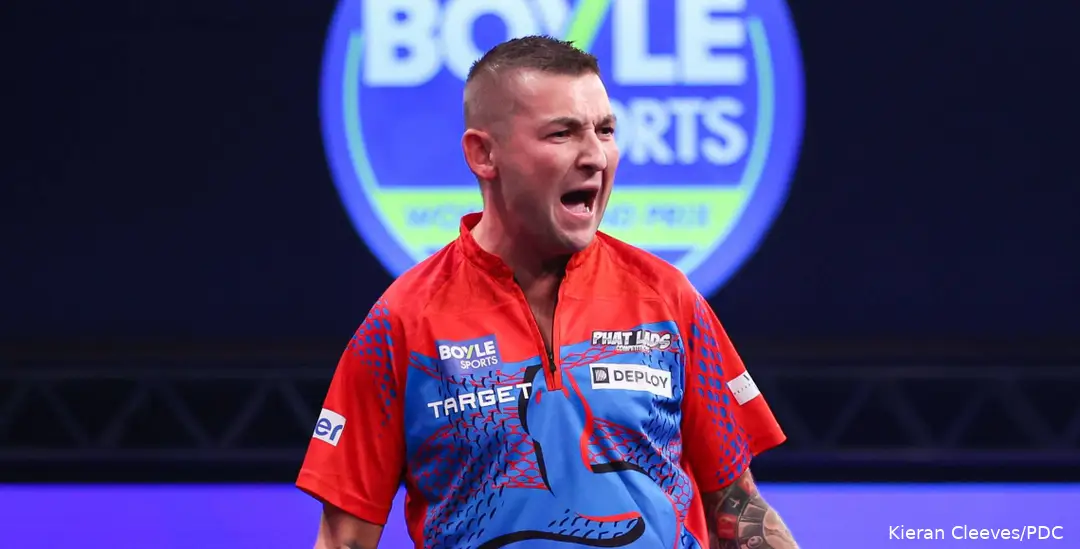 Nathan Aspinall celebrates.