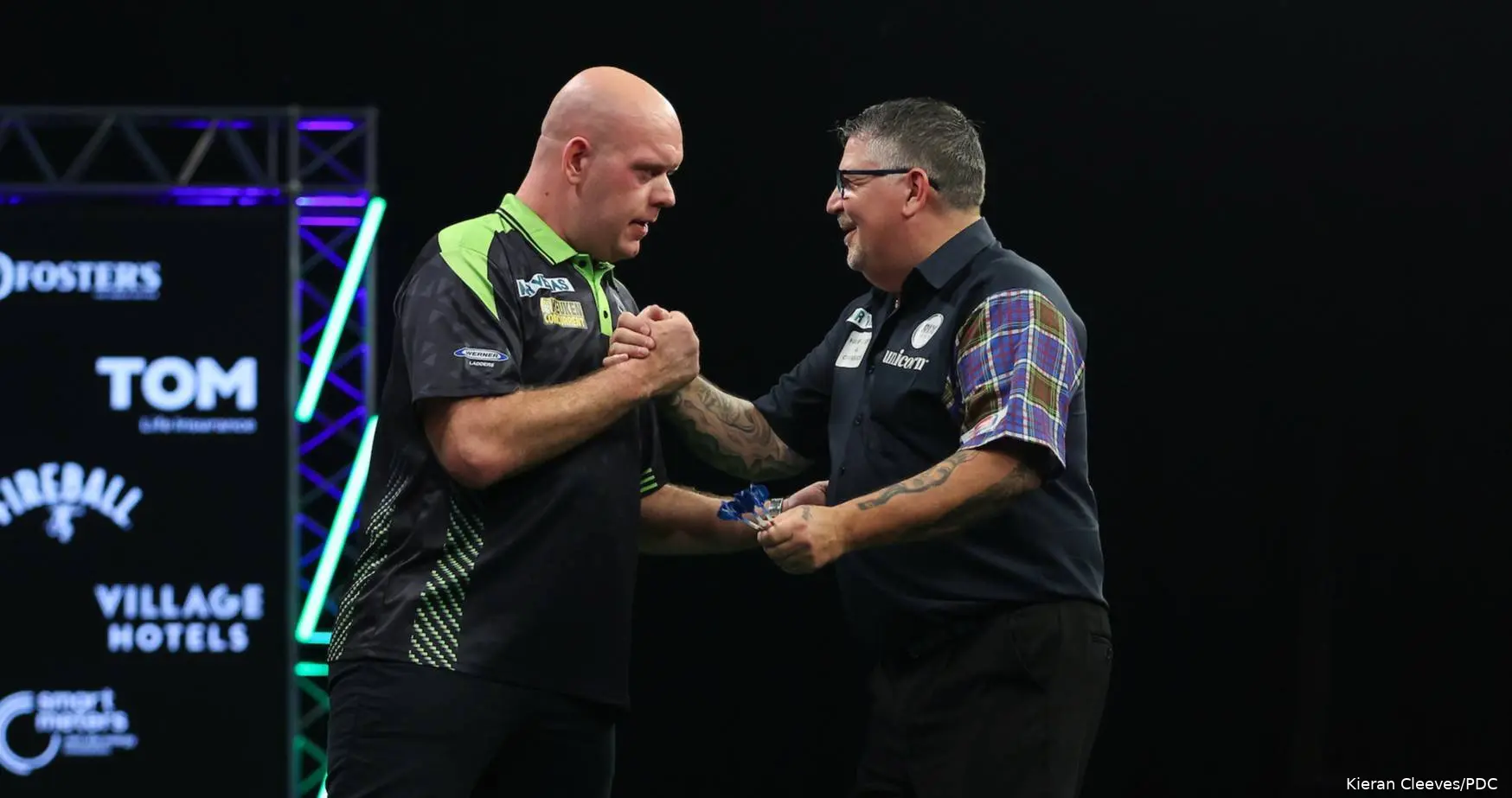 Michael van Gerwen and Gary Anderson shake hands