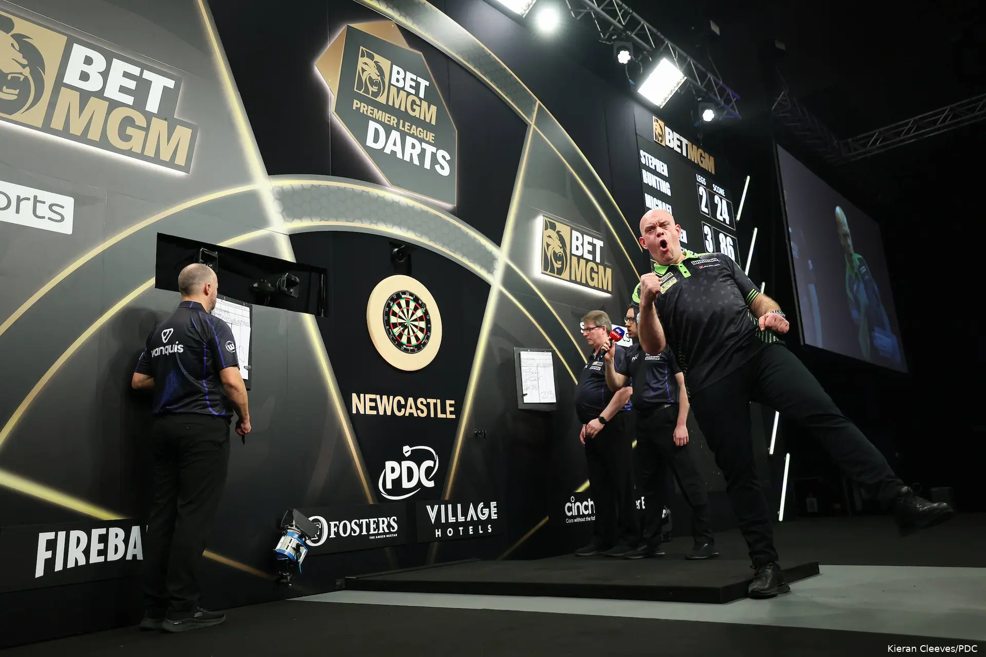 Michael van Gerwen points fist out.