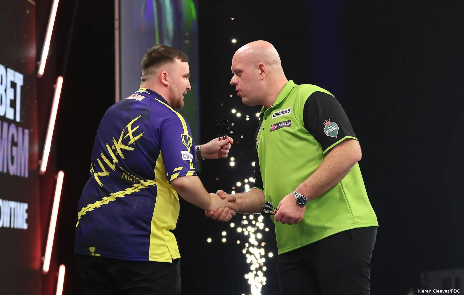 Luke Littler and Michael van Gerwen shake hands