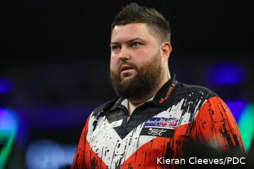 Michael Smith on the oche at the Grand Slam of Darts.