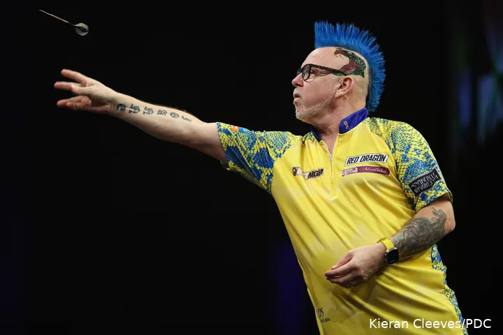 Peter Wright with the signature hairstyle.